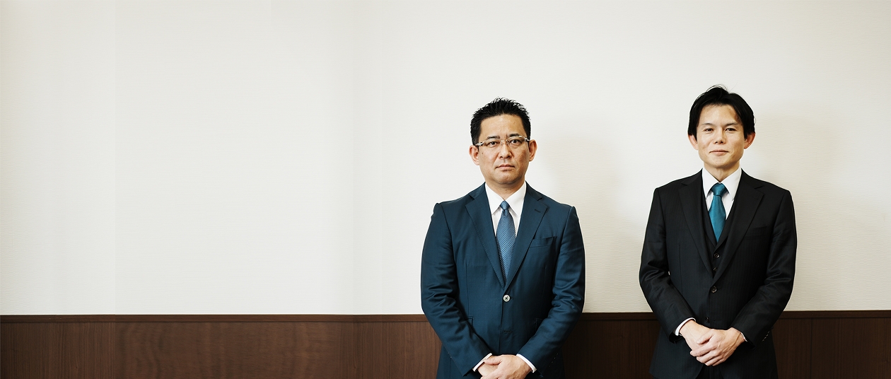 代表取締役社長高巣と代表取締役専務佐口の写真